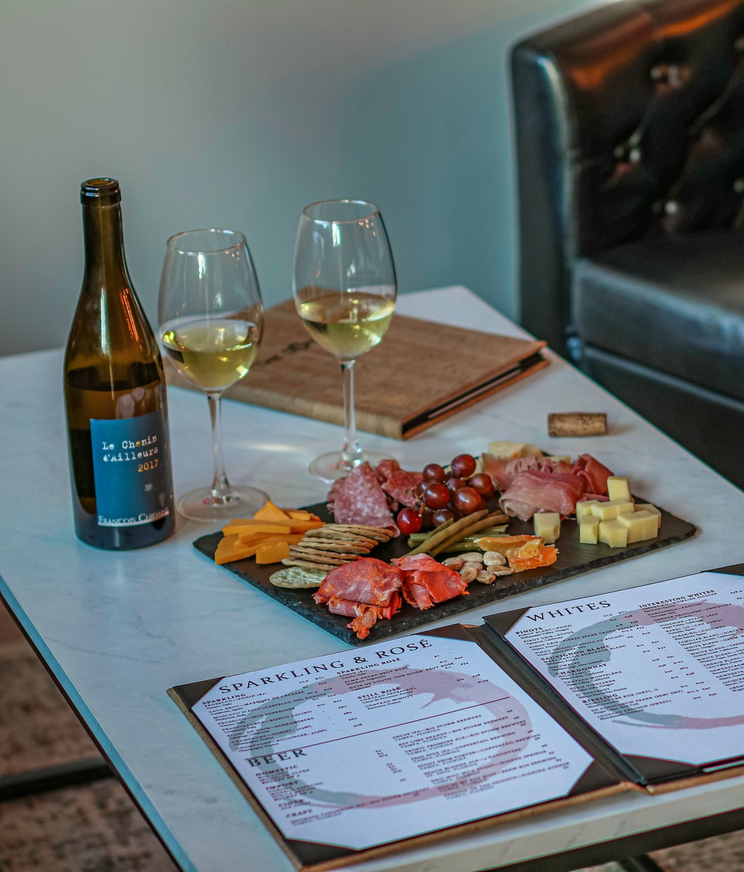Wine, charcuterie and menu at The Sommelier Hideaway